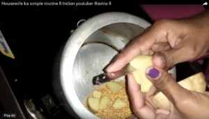 screenshot of YouTube cooking video "Housewife ka simple routine II Indian youtuber Ravina II"