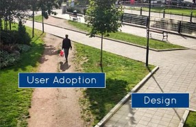 A picture of a human taking a shortcut over gras instead of sticking to the longer pavement route; arguing for user adoption vs. design intention.