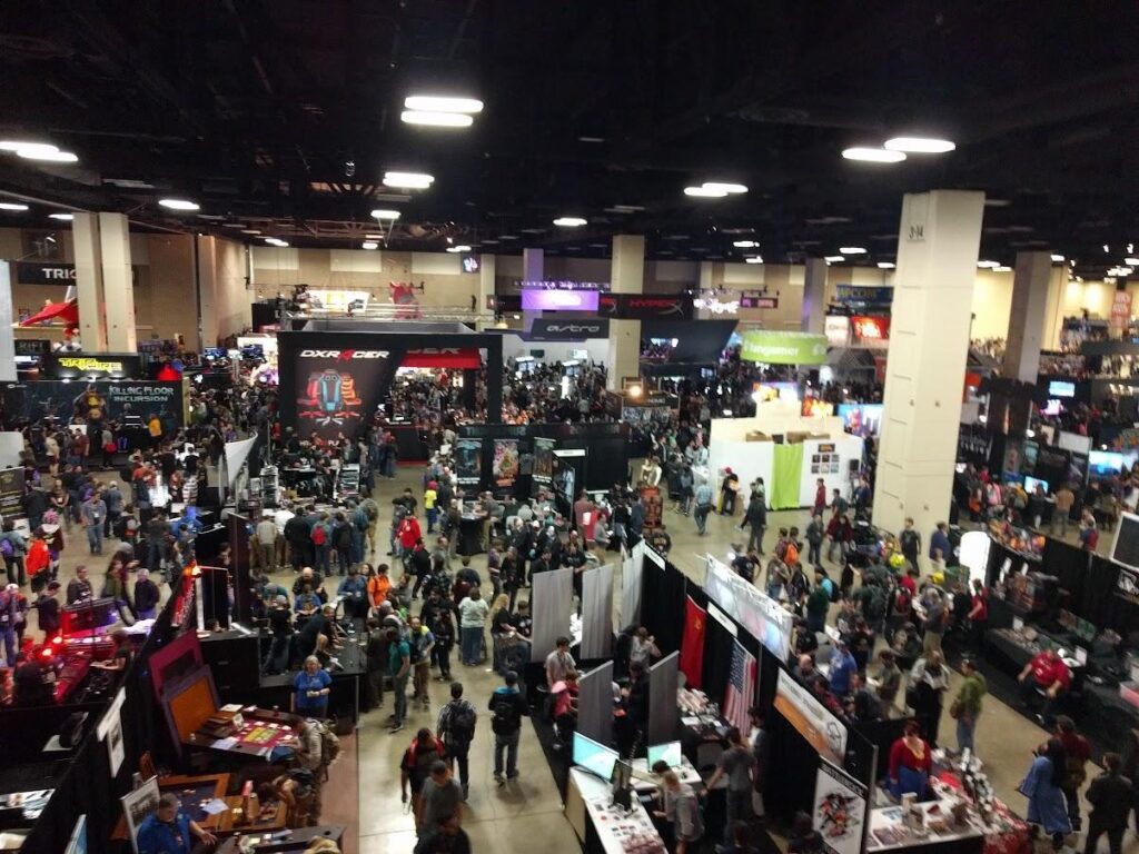 Personal photo of PAX South 2017 show floor  smaller indie booths in the foreground and larger branded booths in the background show the contrast in size and footprint of the two different types of booths discussed.